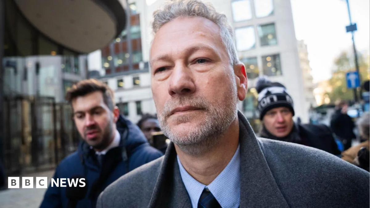 Nathan Gill leaves court after being ordered to pay £22,592 in a bribery case