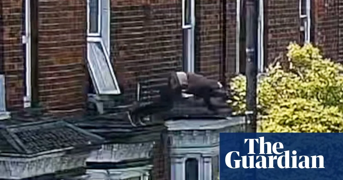 CCTV shows a man jumping from a first-floor window and running towards a police car in Lincoln
